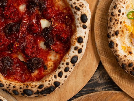 Spicy red-topped wood-fired pizza